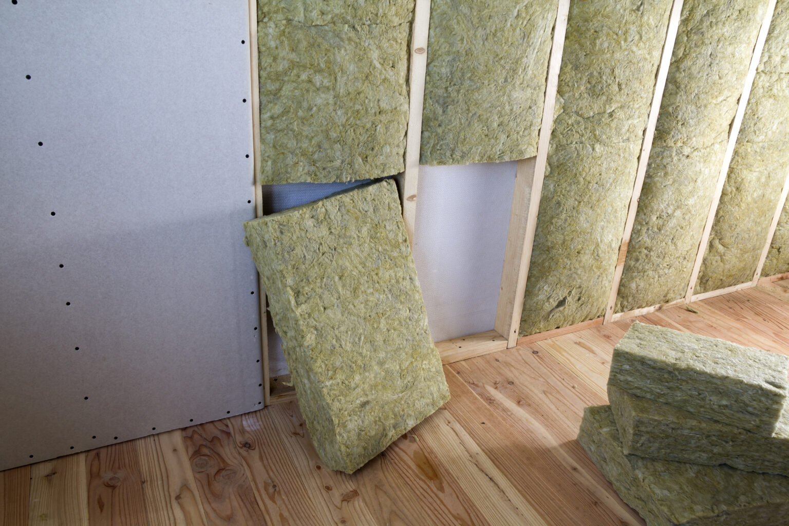 Wooden frame for future walls with drywall plates insulated with